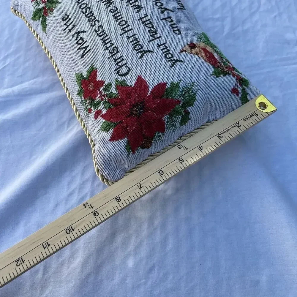 Small tapestry Christmas pillow Poinsettia graphic
